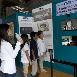 Students interact with the SOFIA display at the Ames Aerospace Encounter