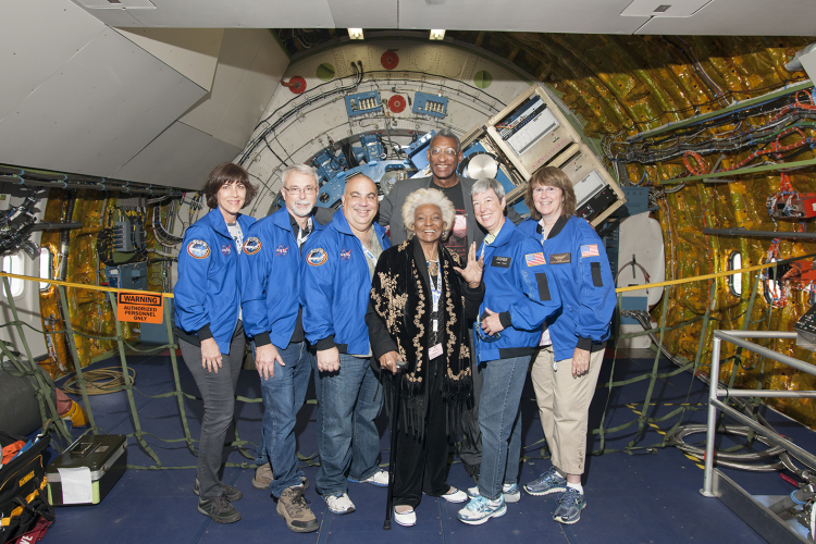 Actress Nichelle Nichols and Airborne Astronomy Ambassadors pose in front of the observatory telescope