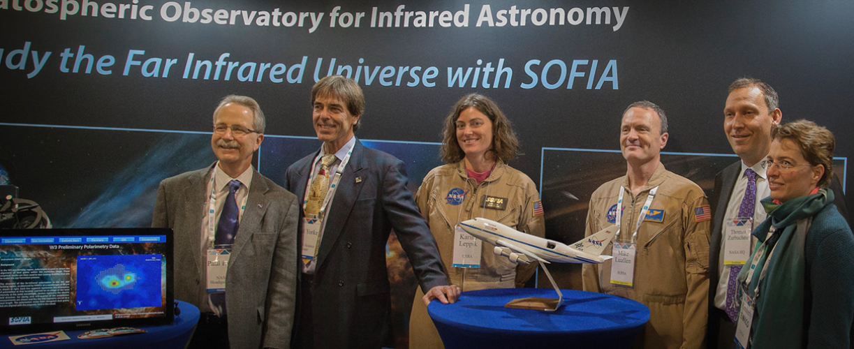 NASA and SOFIA staff at the SOFIA exhibit